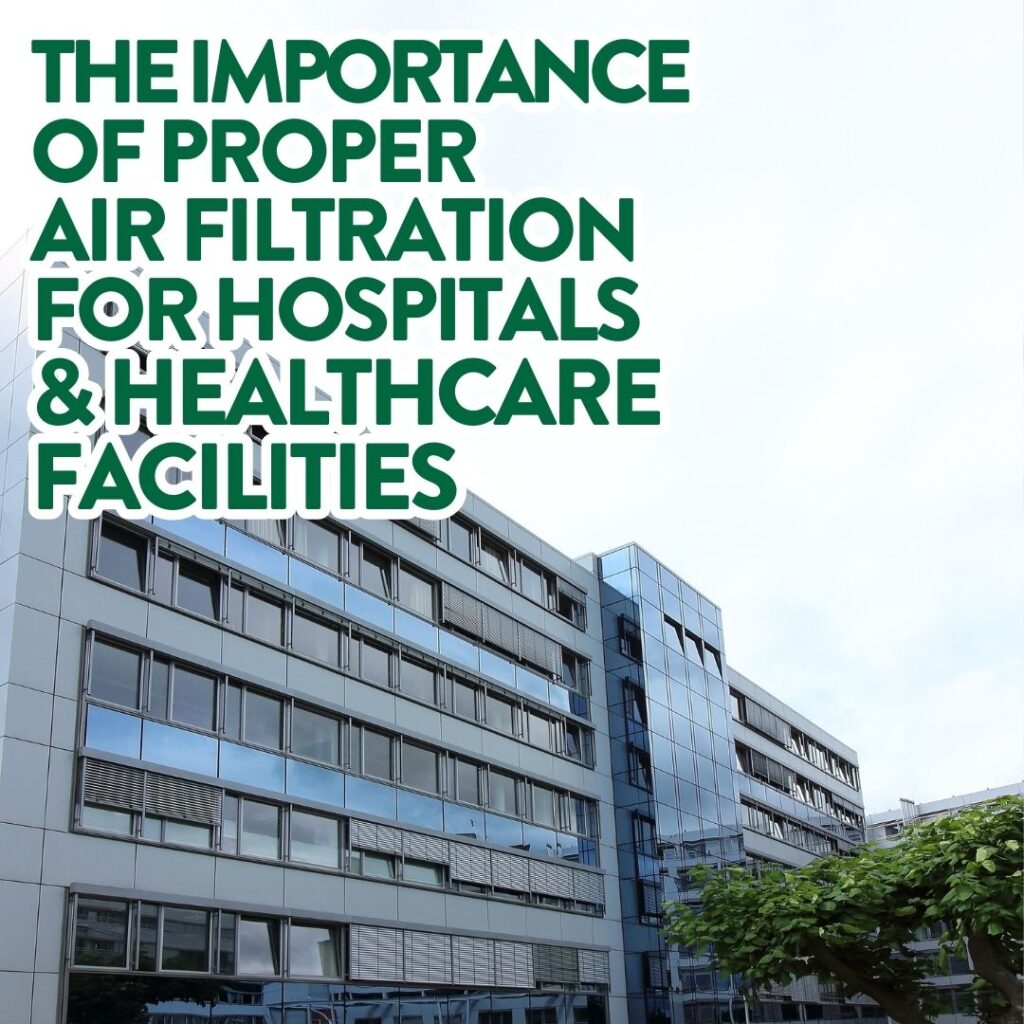 Forest green text with a white outline reads "The importance of proper air filtration for hospitals and healthcare facilities." There is a seven floor hospital with a lot of windows. It is bluish grey in colour. There are two trees in front of the hospital. 