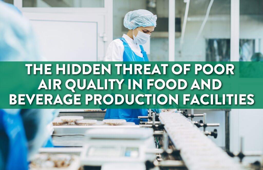 A woman has on a white hair net, blue rubber apron, white shirt, a white face mask and blue gloves. She is inspecting food on the line.